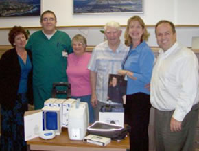 Donating portable oxygen generator to Little Company of Mary Hospital